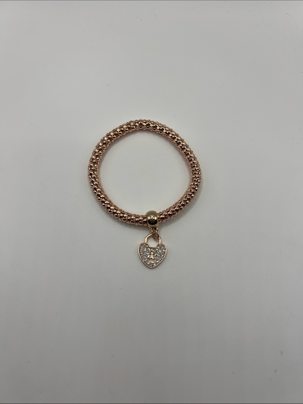 019. Rose Gold Heart Charm Stretch Bracelet 6 1/2” - 7”